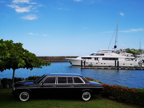 LOS SUENOS MARINA. MERCEDES 300D LIMOUSINE AND COSTA RICAN YACHT.